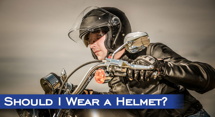 Should I wear a helmet when riding a motorcycle or bike?