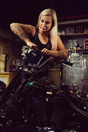 Female motorcycle mechanic