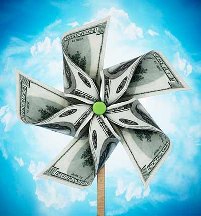 Money pinwheel representing how Progressive Insurance is only in business to turn a profit