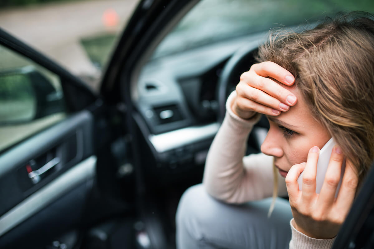 What to do and not do after a Denver car crash - frustrated driver talks on cell phone